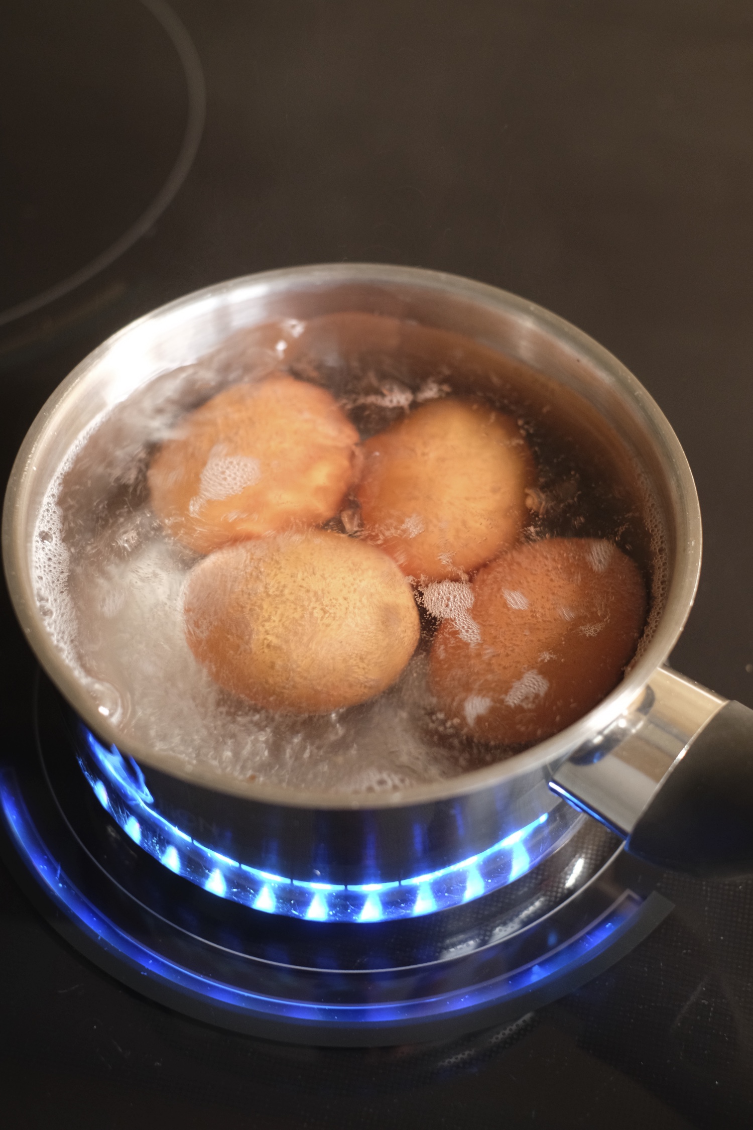 boiling eggs in a pot for egg salad