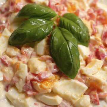 egg salad with yogurt and red pepper on a plate