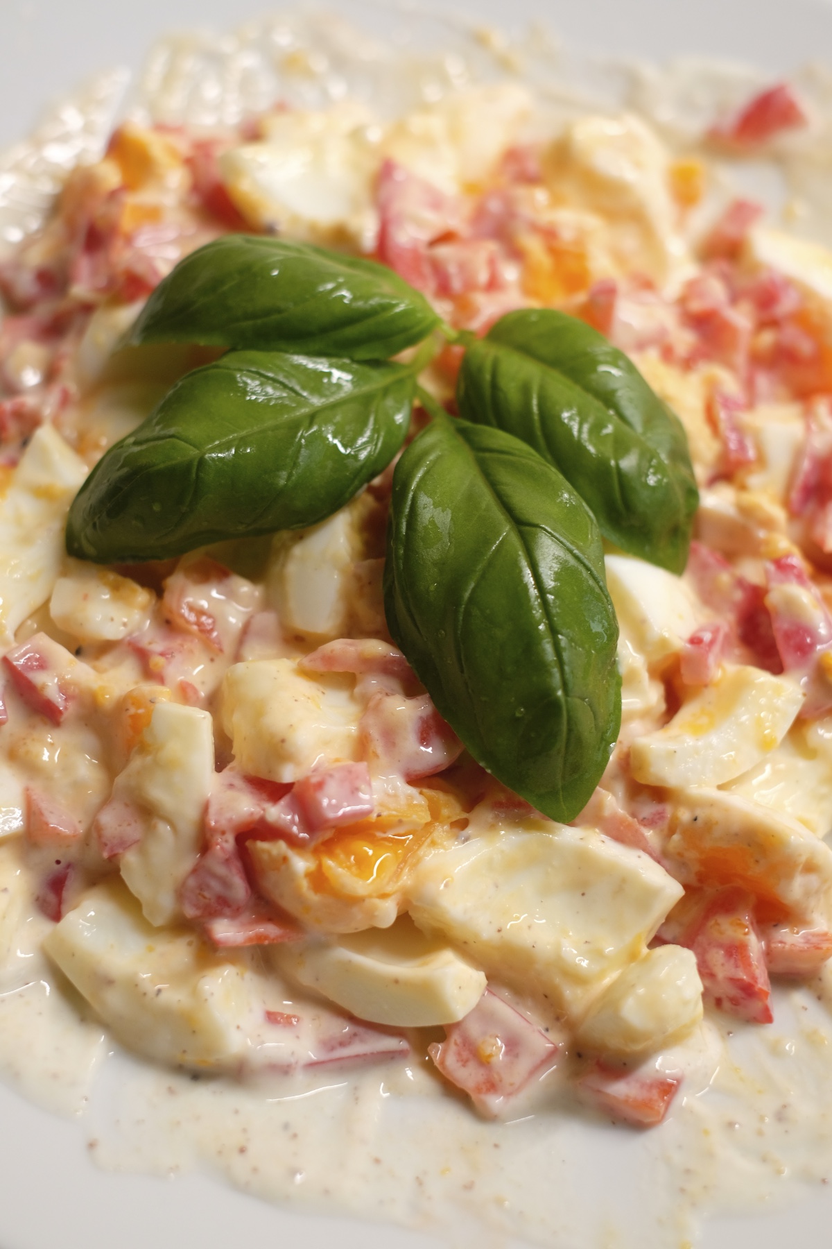egg salad with yogurt and red pepper on a plate